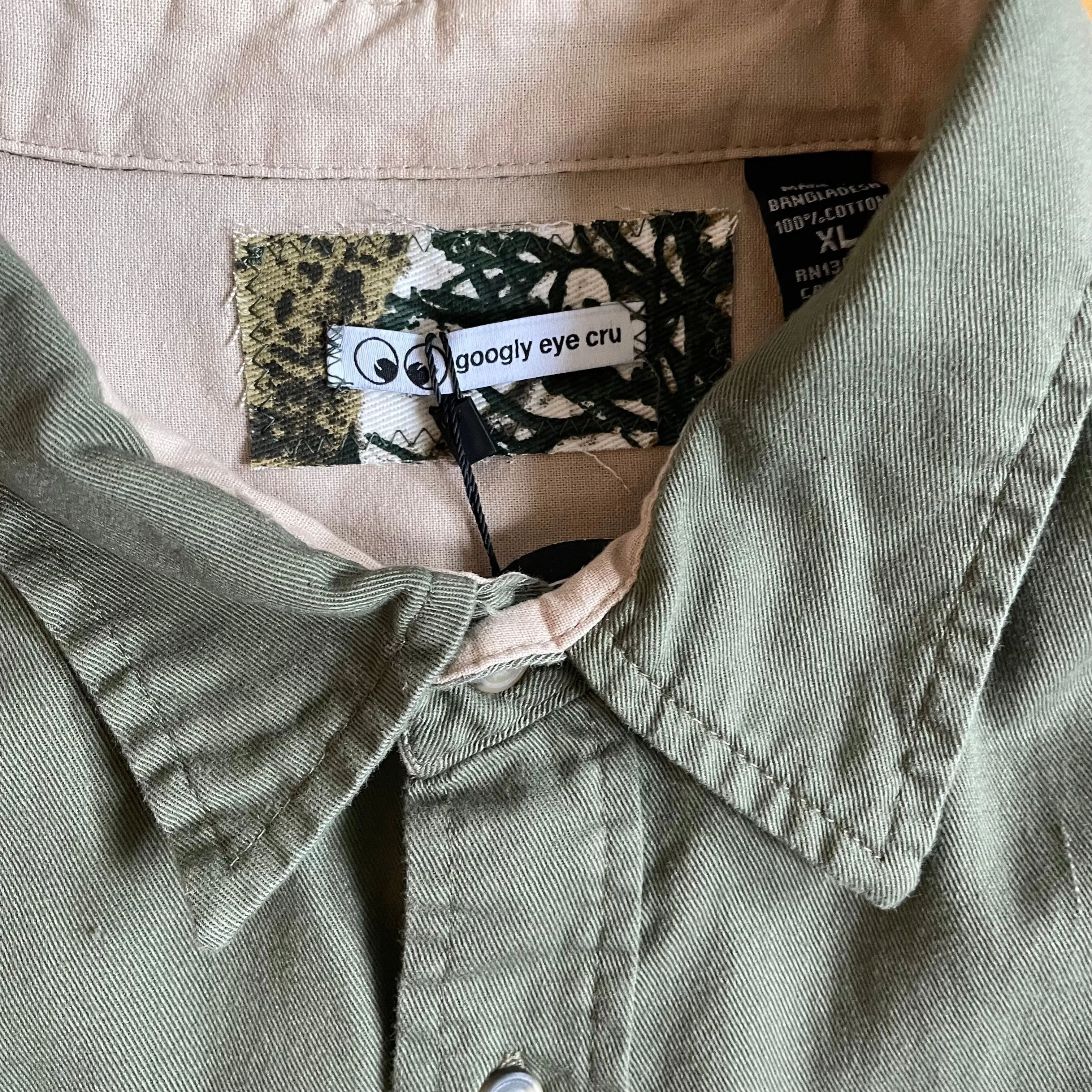 UPCYCLED Army green boxy cropped top with Real Tree camo and denim hem